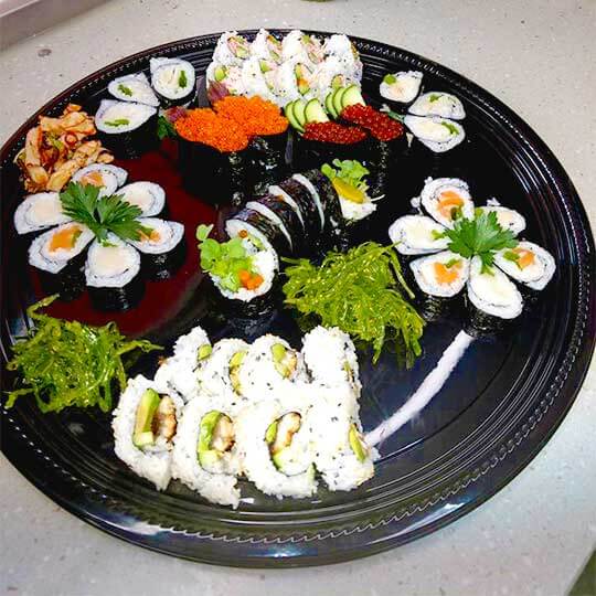 Large sushi platter for take-out or delivery.